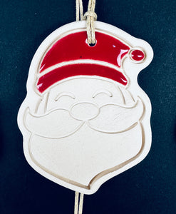 Boîte de 4 pendentifs Père Noël pour sapin