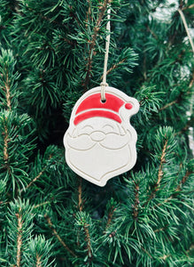 Boîte de 4 pendentifs Père Noël pour sapin